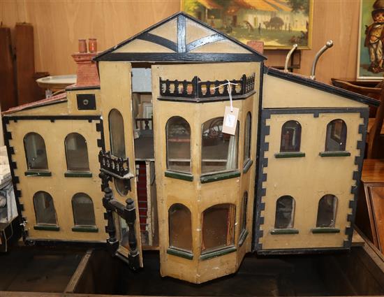 A large painted dolls house W.118cm